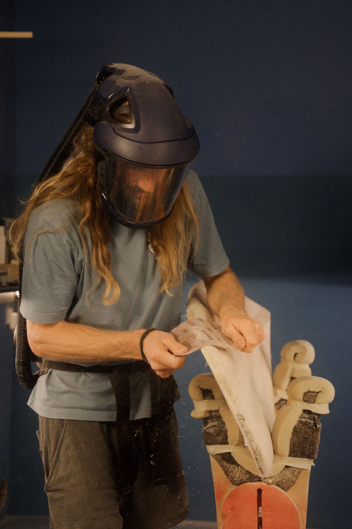 Hand finishing an ACORA board